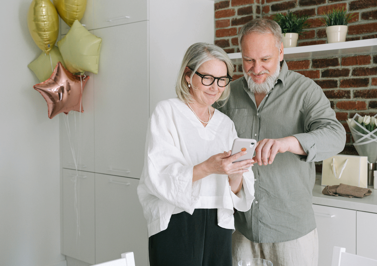 A retired couple relaxing together at home